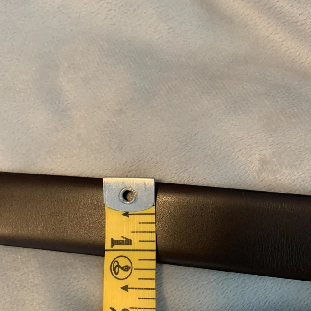 The mens warehouse smooth brown leather belt made in Italy size 38 thin dressy